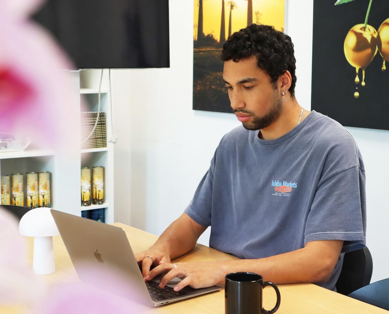 Hotjar | Man working at his laptop